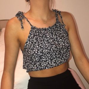 Floral brandy melville shirt ties on top